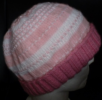 Création Bonnet rose et blanc enfant fille au point fantaisie, tricoté main